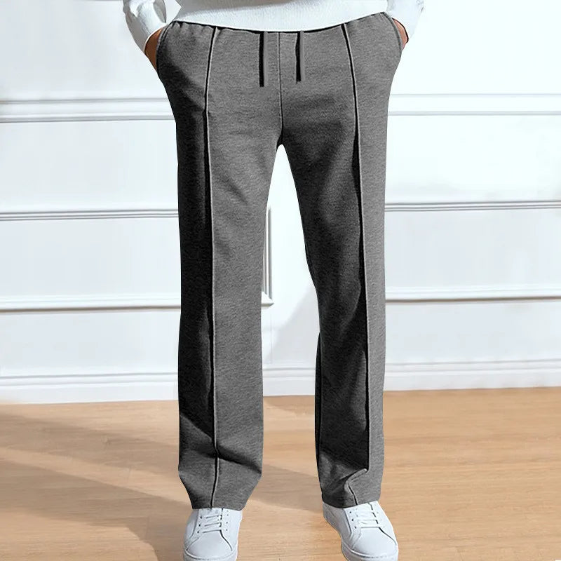 Pantalon homme coupe slim moderne, silhouette épurée et look soigné