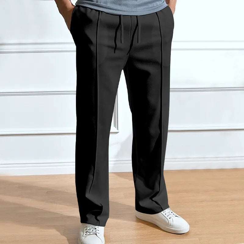 Pantalon homme coupe slim moderne, silhouette épurée et look soigné