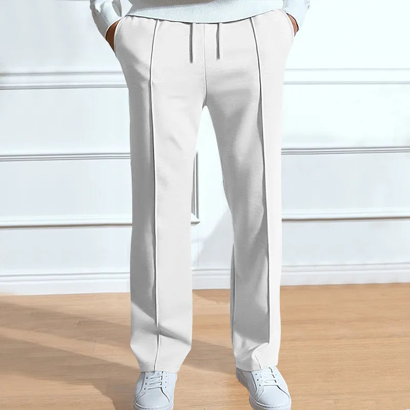 Pantalon homme coupe slim moderne, silhouette épurée et look soigné