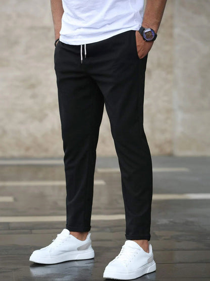 Pantalon homme stretch coupe effilée infroissable disponible en plusieurs coloris