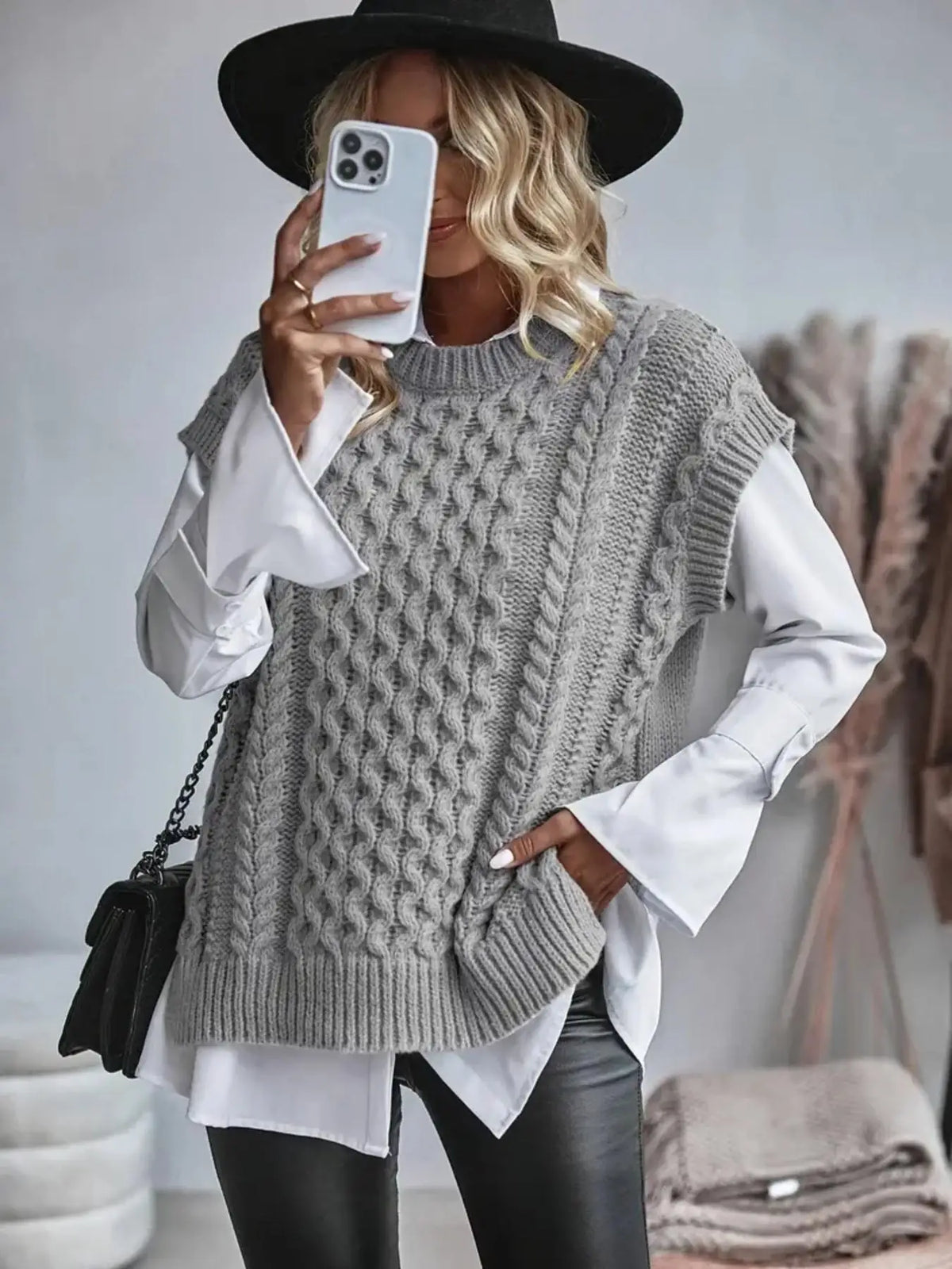Gilet femme tricot torsadé col rond coupe ample légèrement allongée