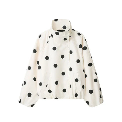 Veste femme à pois noirs col montant zippée fond blanc