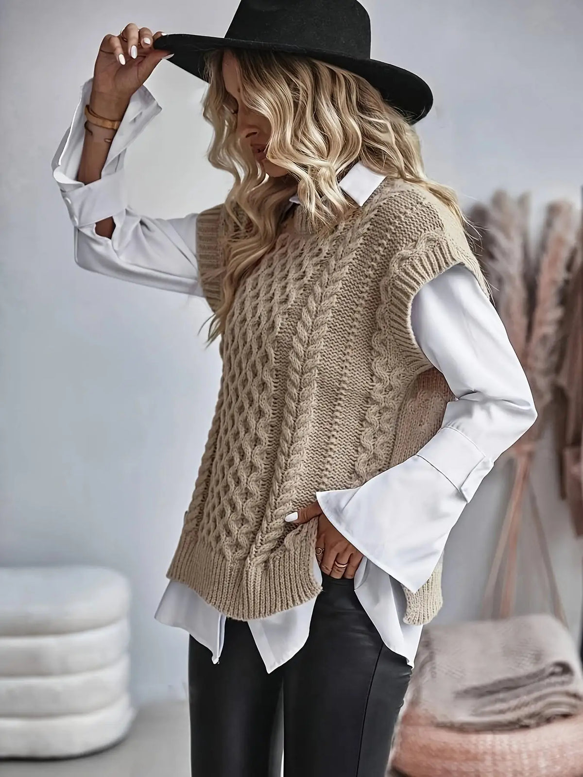 Gilet femme tricot torsadé col rond coupe ample légèrement allongée