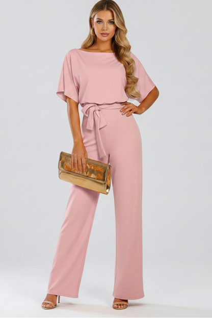 Combinaison femme jambes larges avec ceinture nouée et col rond