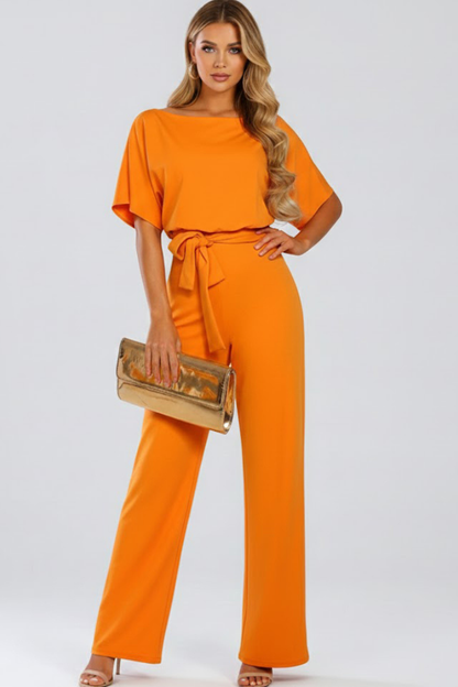 Combinaison femme jambes larges avec ceinture nouée et col rond