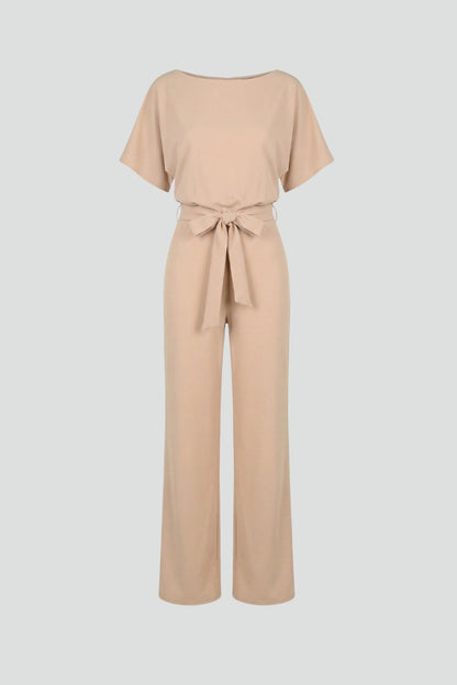 Combinaison femme jambes larges avec ceinture nouée et col rond