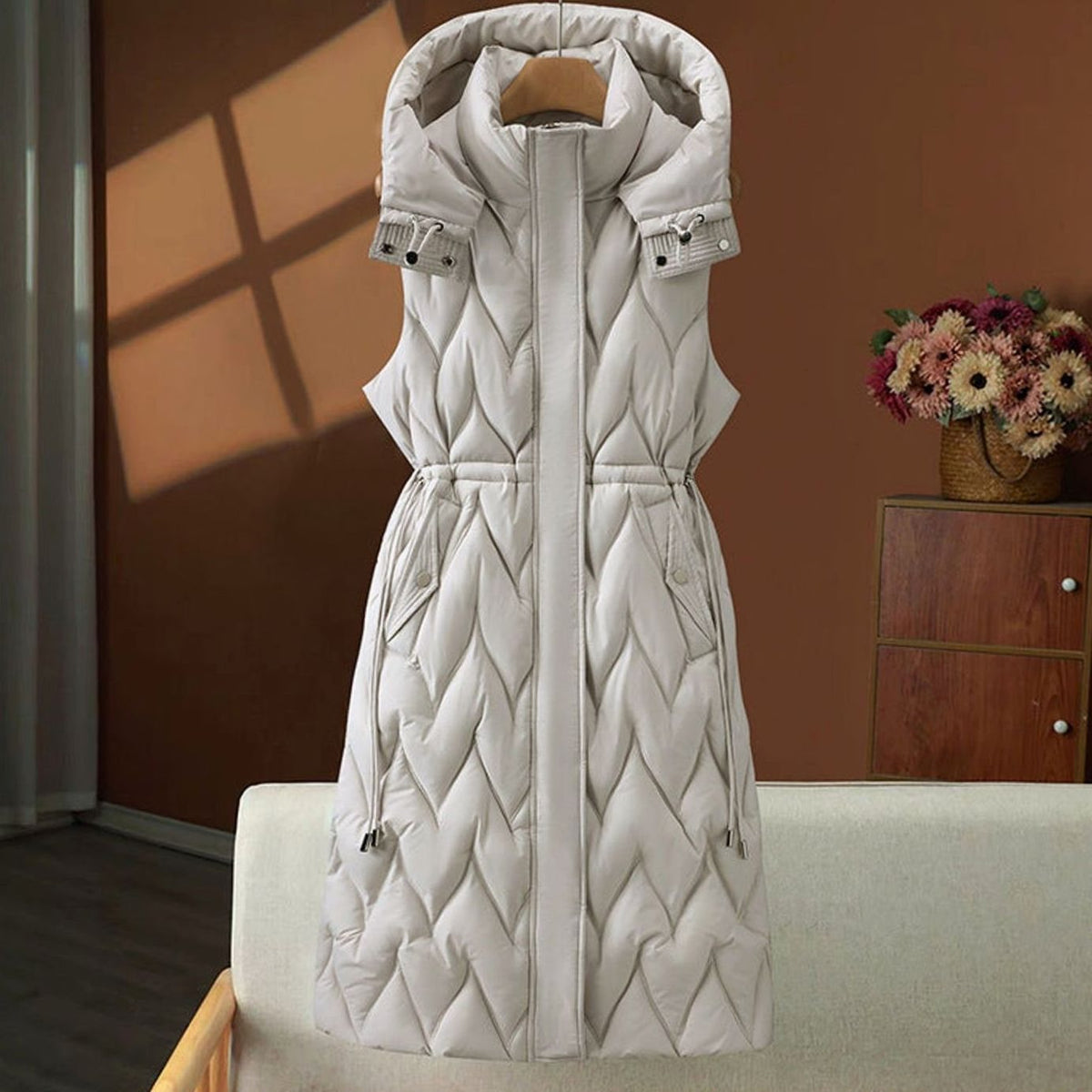 Gilet long matelassé femme à capuche sans manches longueur maxi
