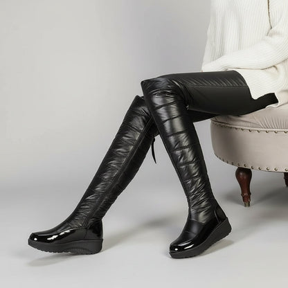 Cuissardes femme hiver noires matelassées avec nœud décoratif à cristaux