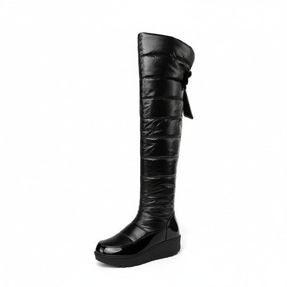 Cuissardes femme hiver noires matelassées avec nœud décoratif à cristaux