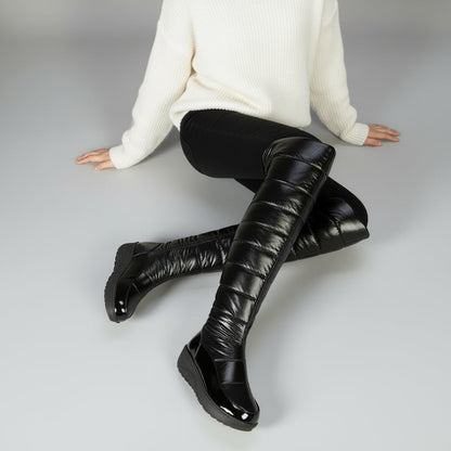 Cuissardes femme hiver noires matelassées avec nœud décoratif à cristaux