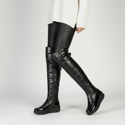 Cuissardes femme hiver noires matelassées avec nœud décoratif à cristaux