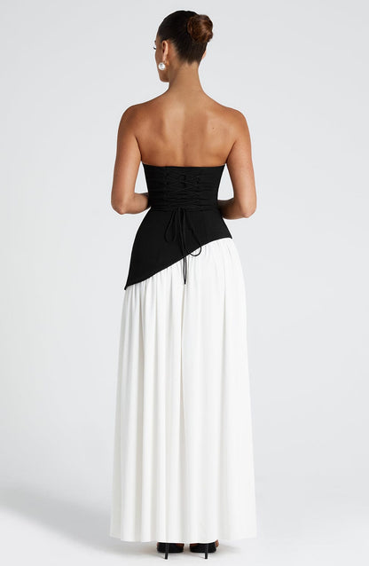 Robe de soirée maxi sans bretelles taille asymétrique fente haute