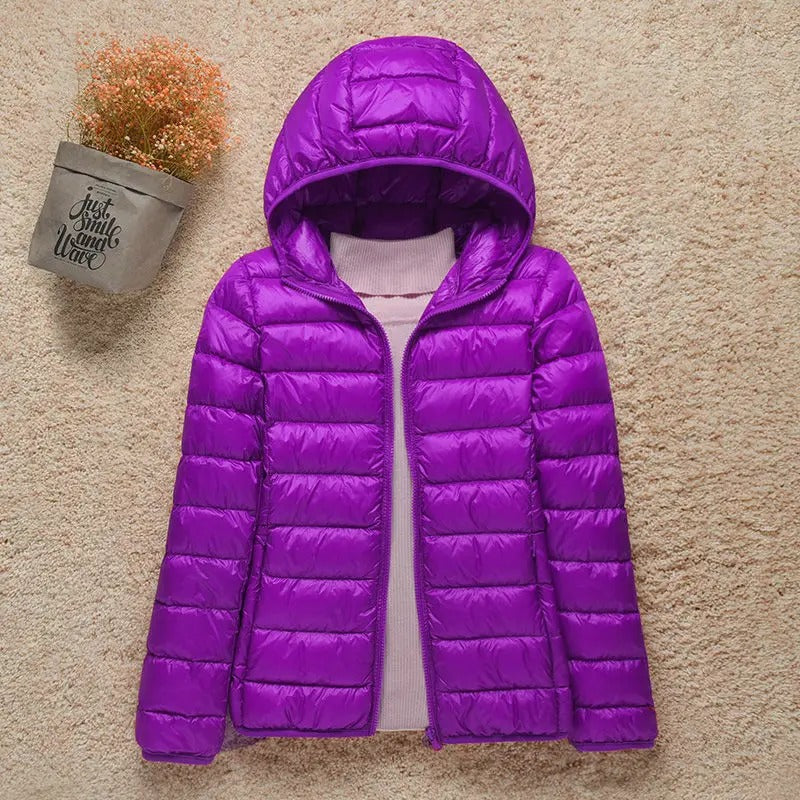 Doudoune légère compressible femme avec capuche matelassée chaude