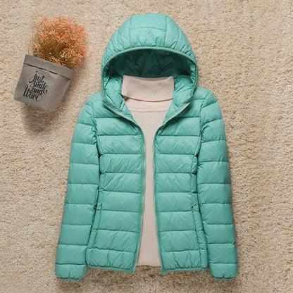 Doudoune légère compressible femme avec capuche matelassée chaude