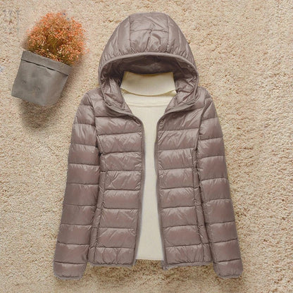 Doudoune légère compressible femme avec capuche matelassée chaude