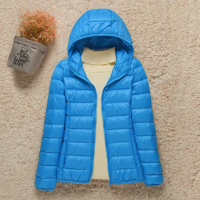 Doudoune légère compressible femme avec capuche matelassée chaude