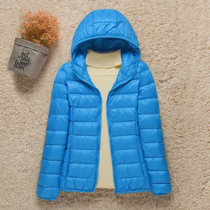 Doudoune légère compressible femme avec capuche matelassée chaude