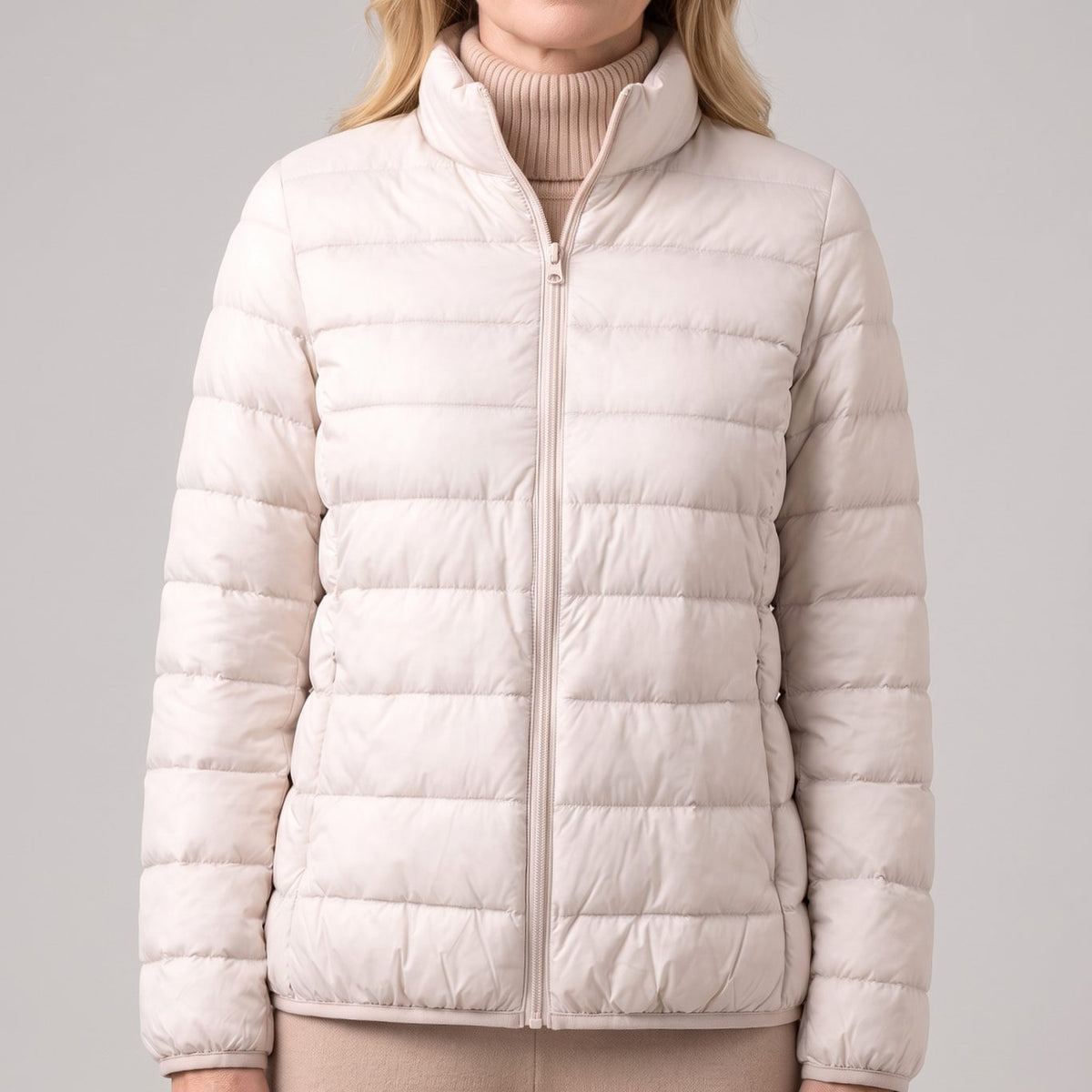 Doudoune légère compressible femme avec duvet d'oie et col montant