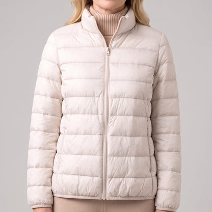 Doudoune légère compressible femme avec duvet d'oie et col montant