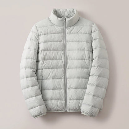 Doudoune légère compressible femme avec duvet d'oie et col montant