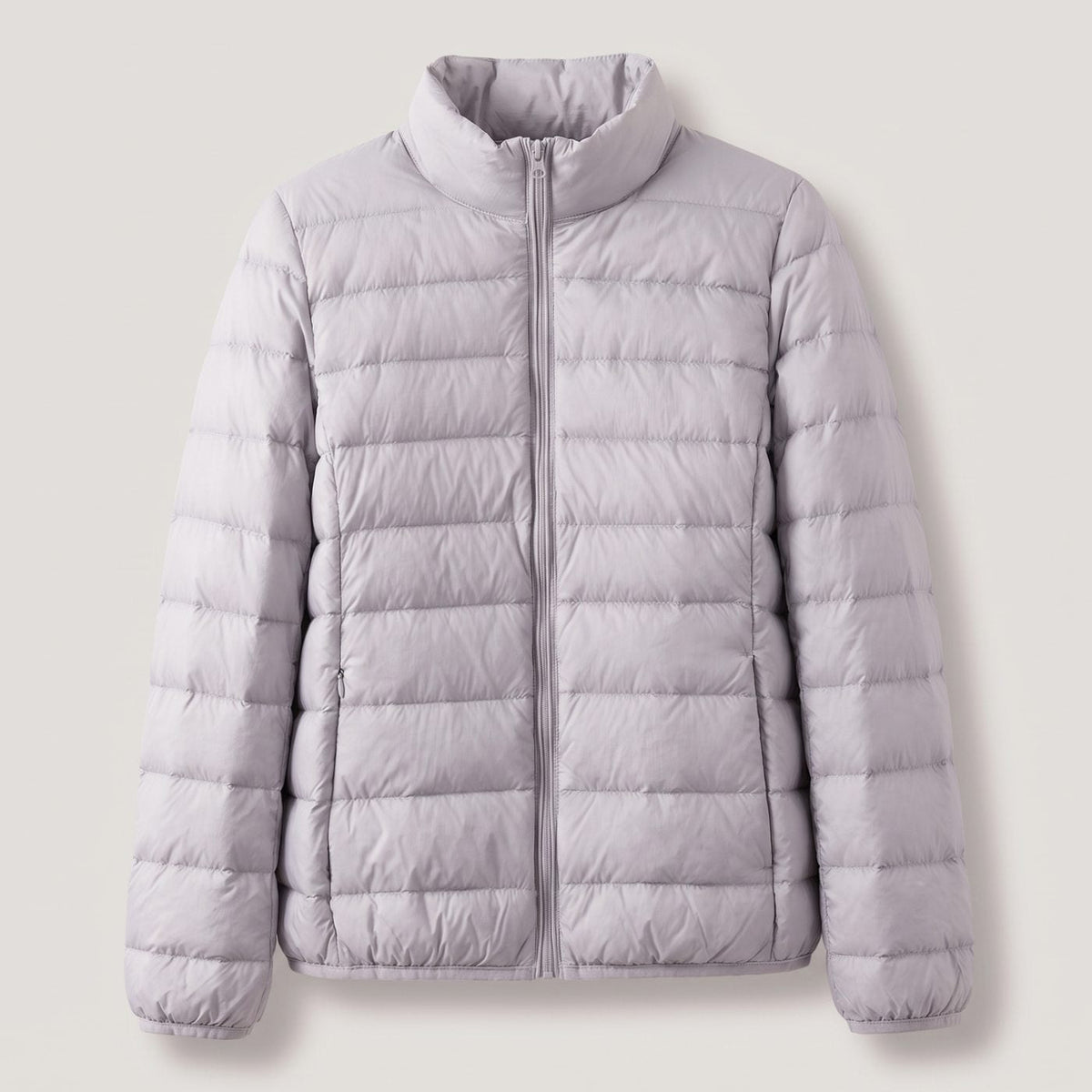 Doudoune légère compressible femme avec duvet d'oie et col montant