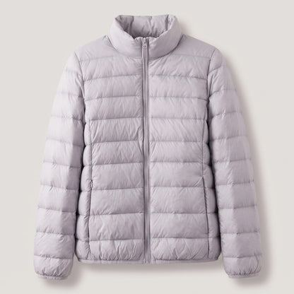 Doudoune légère compressible femme avec duvet d'oie et col montant